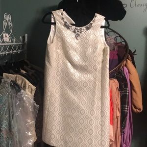 Brand new white dress with jewel at neckline.